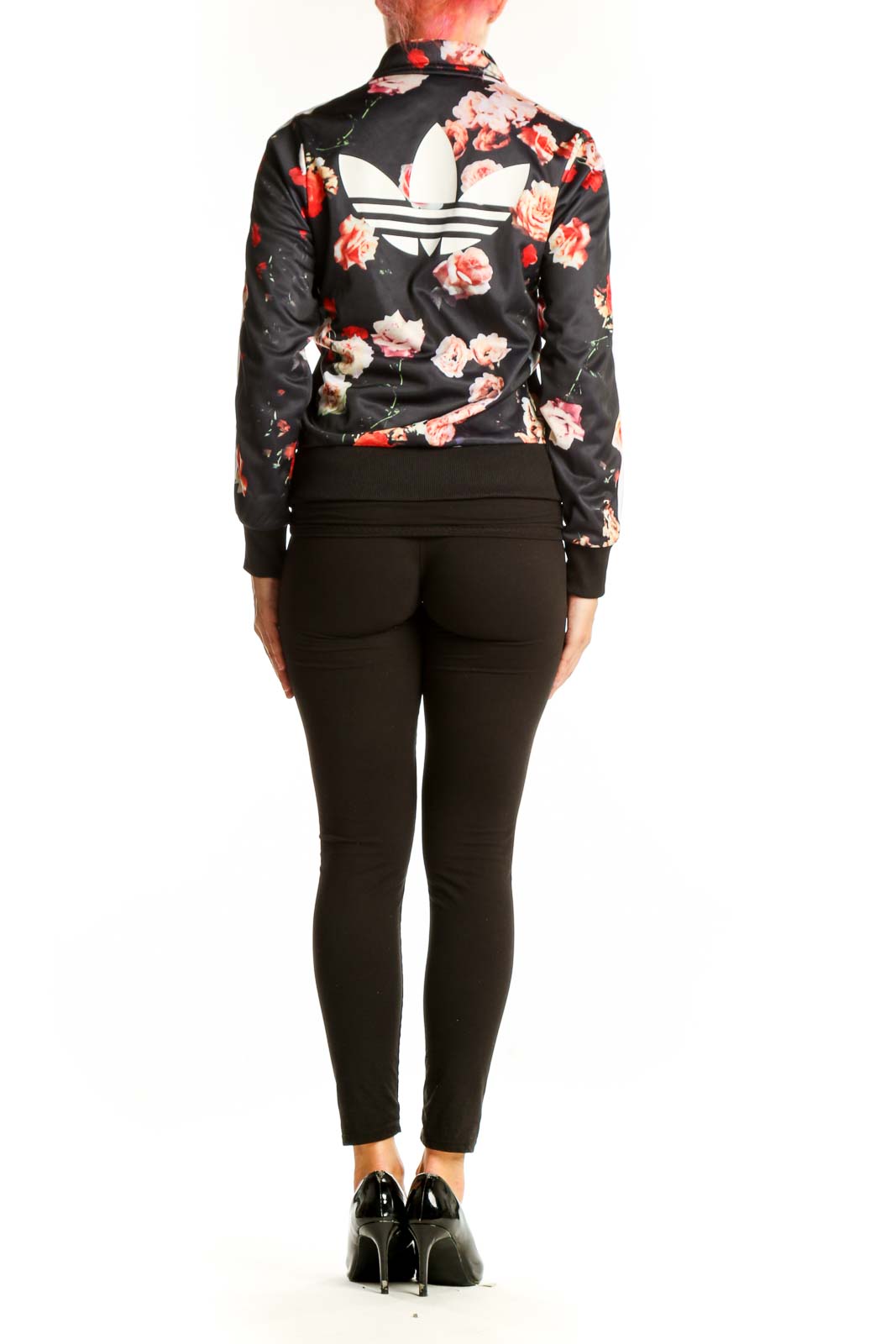 Side view of Adidas black floral athletic jacket showing three-stripe sleeve detail
