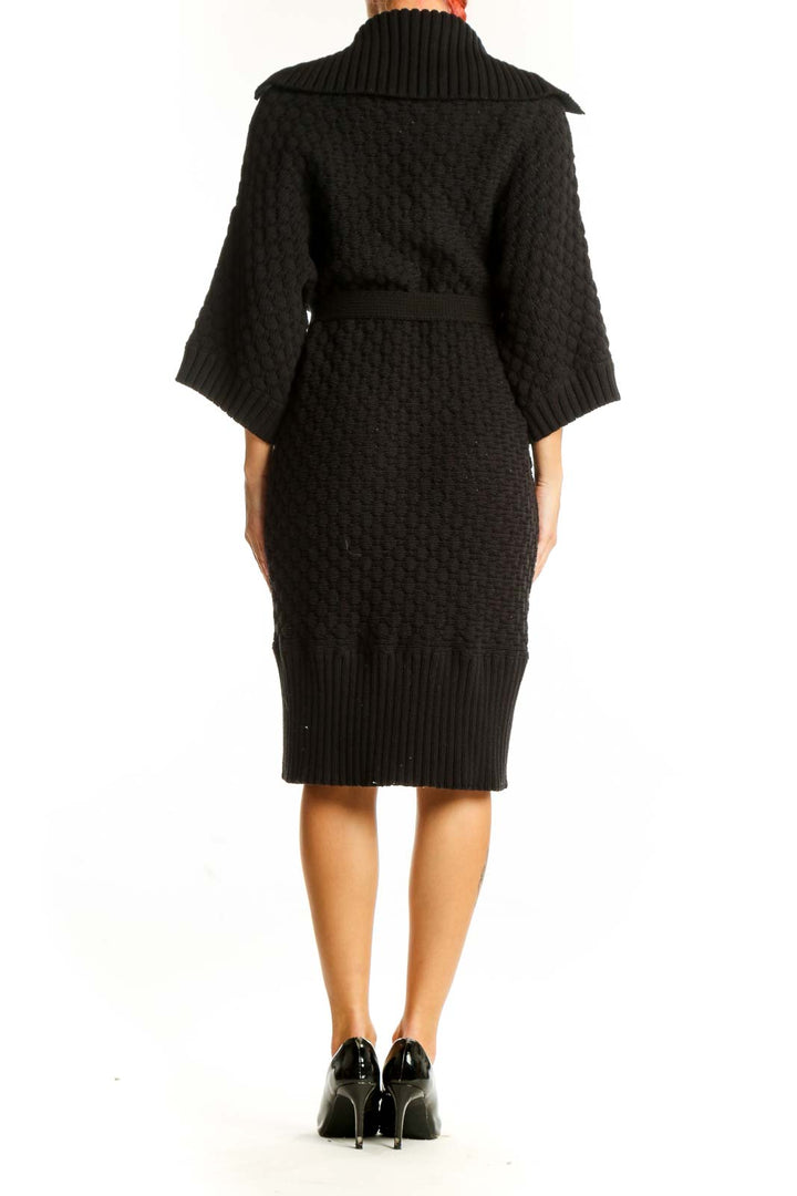 Side view of Jones New York black knitted belted cardigan coat on model