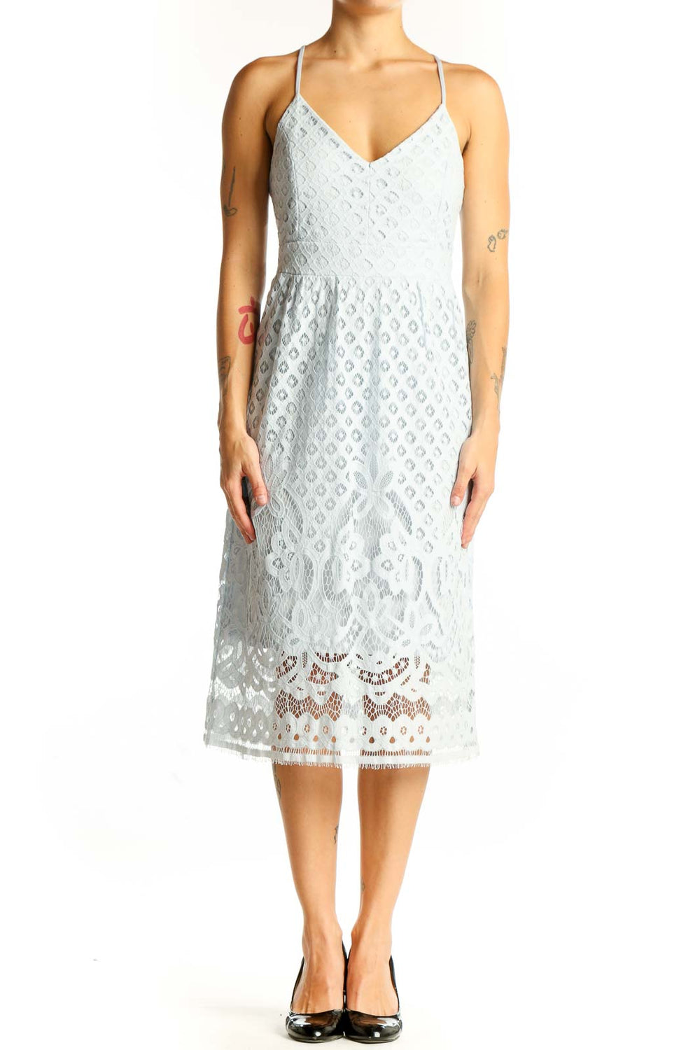 Front view of light blue lace midi dress with eyelet pattern