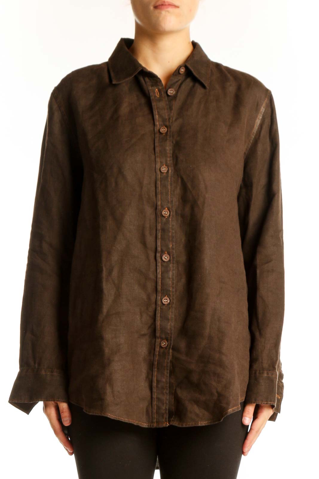 Front view of Quince brown button-down collared shirt on model