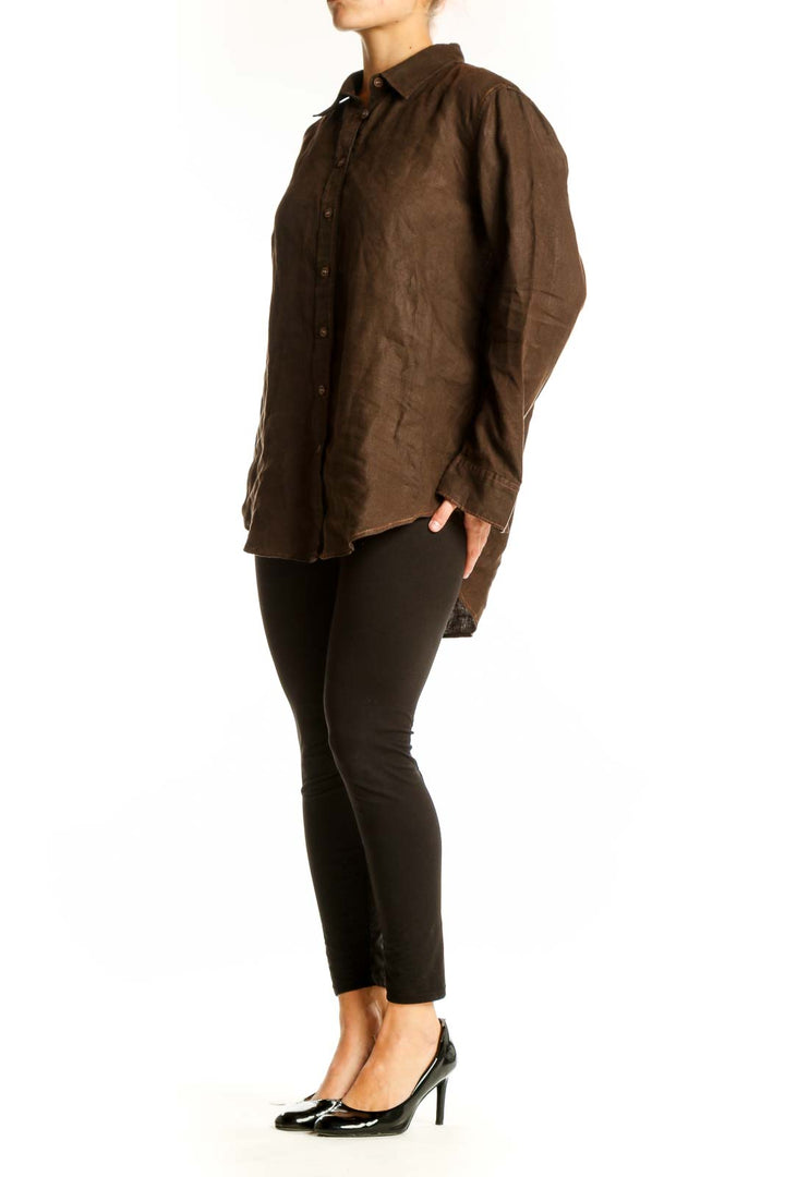 Front view of Quince brown button-down collared shirt on model