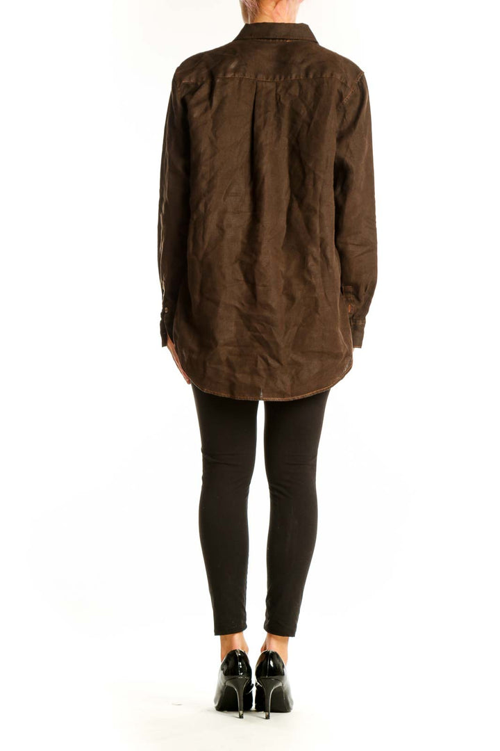 Back view of Quince brown button-down collared shirt on model
