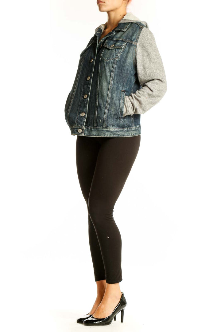 Front view of Express denim jacket with gray knit sleeves
