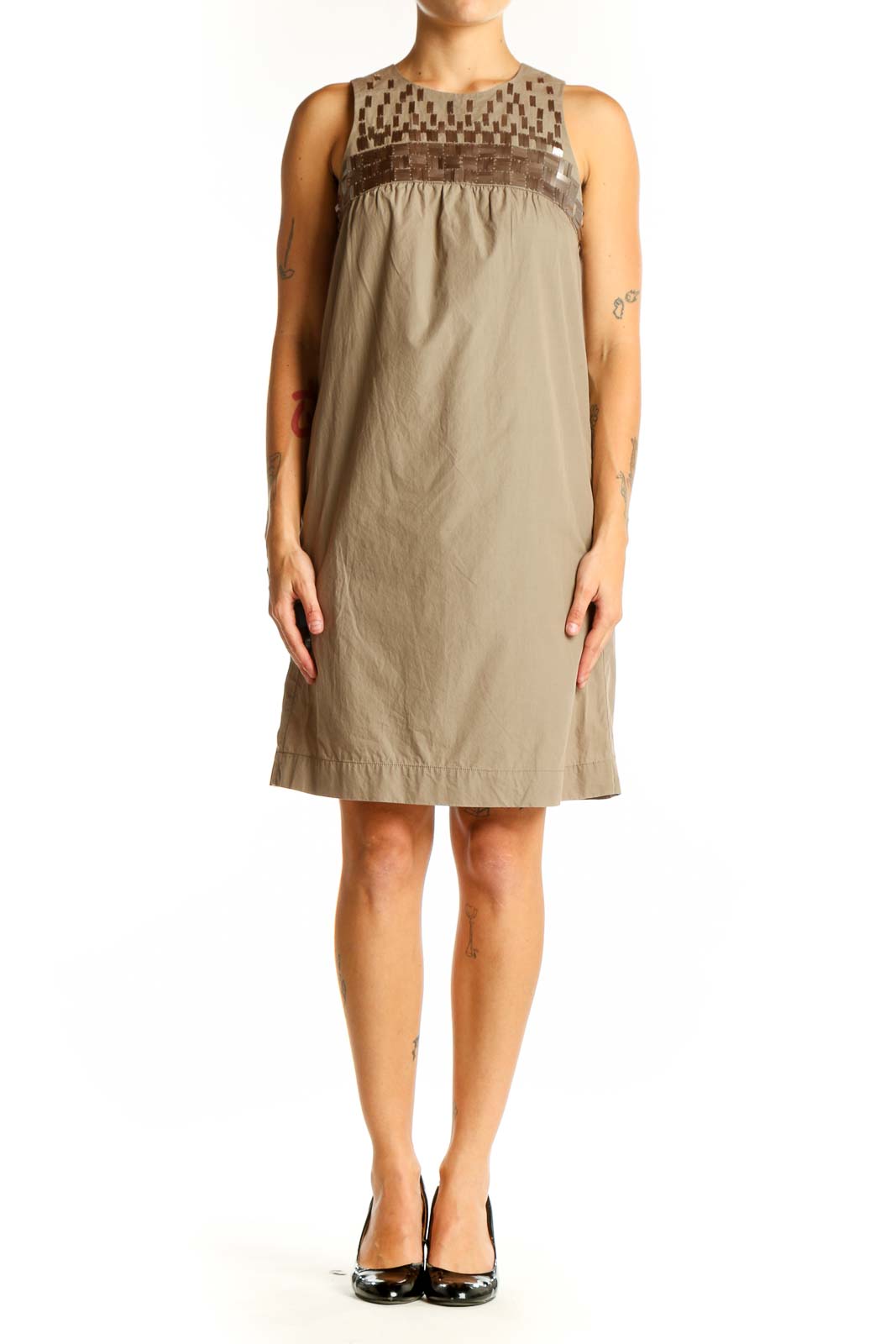 Front view of Vince beige cotton sleeveless shift dress with geometric yoke pattern