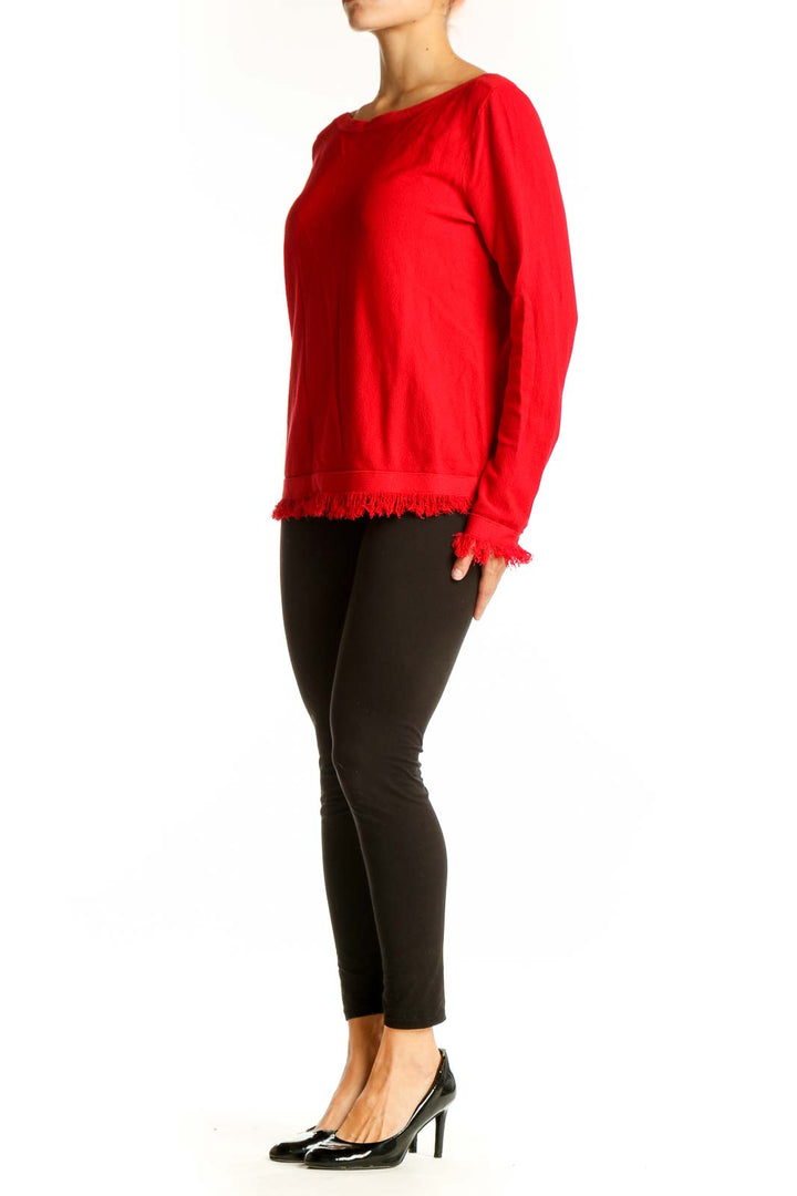 Front view of red Ann Taylor boatneck sweater with fringe trim