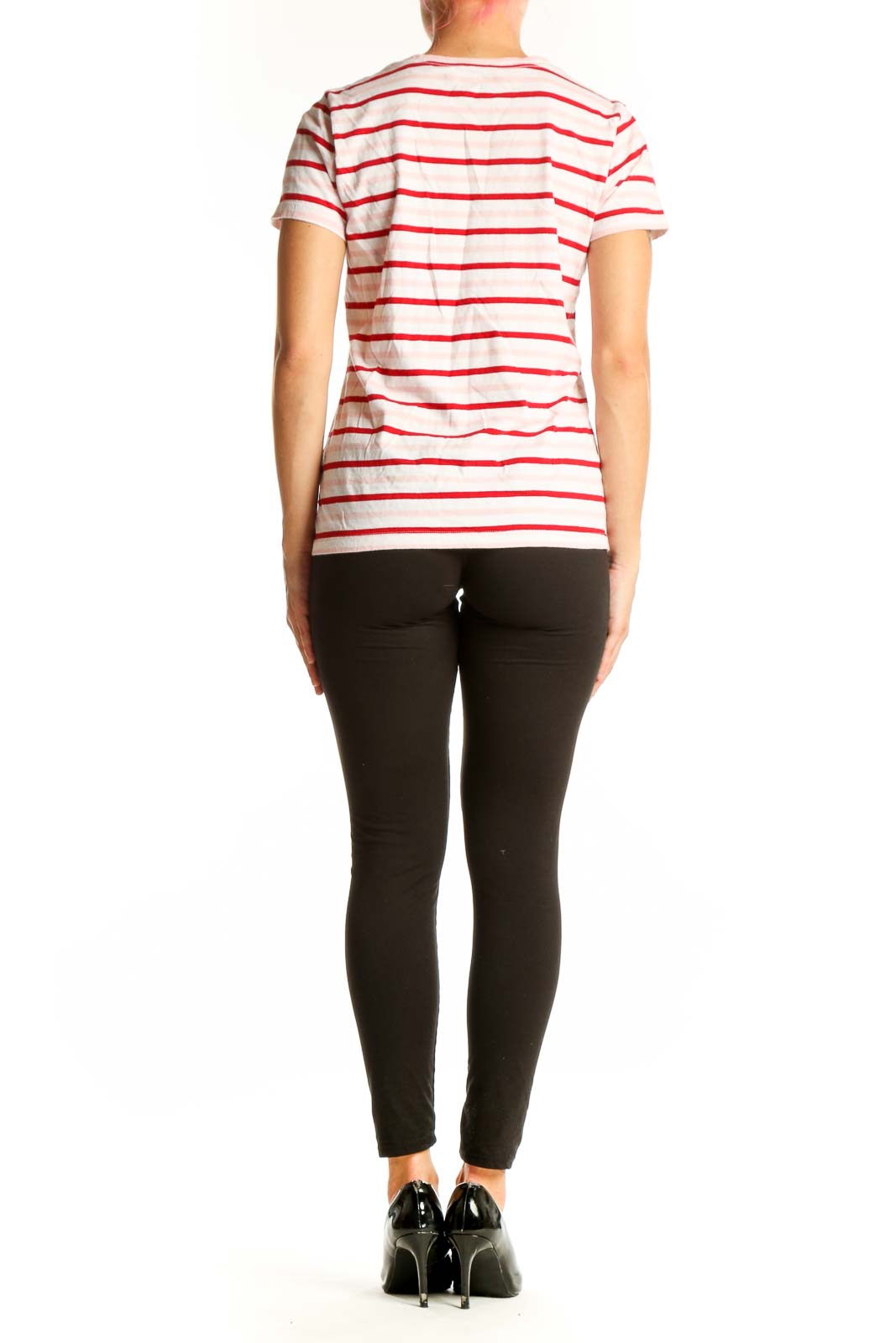 Side view of woman wearing J.Crew white and red striped cotton t-shirt with black pants