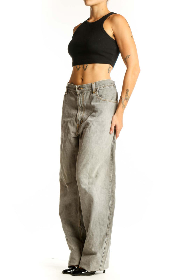 Front view of Levi's light gray wide-leg denim jeans on model