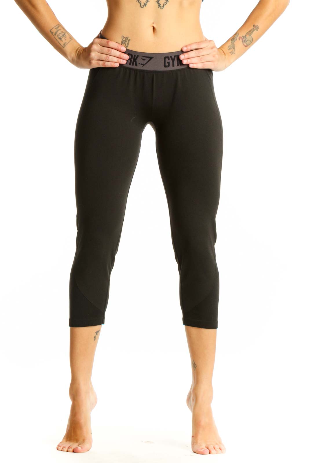 Front view of black Gymshark capri leggings with high waistband