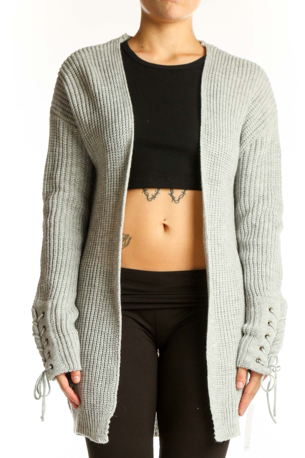 Front view of gray chunky knit cardigan with lace-up sleeve details