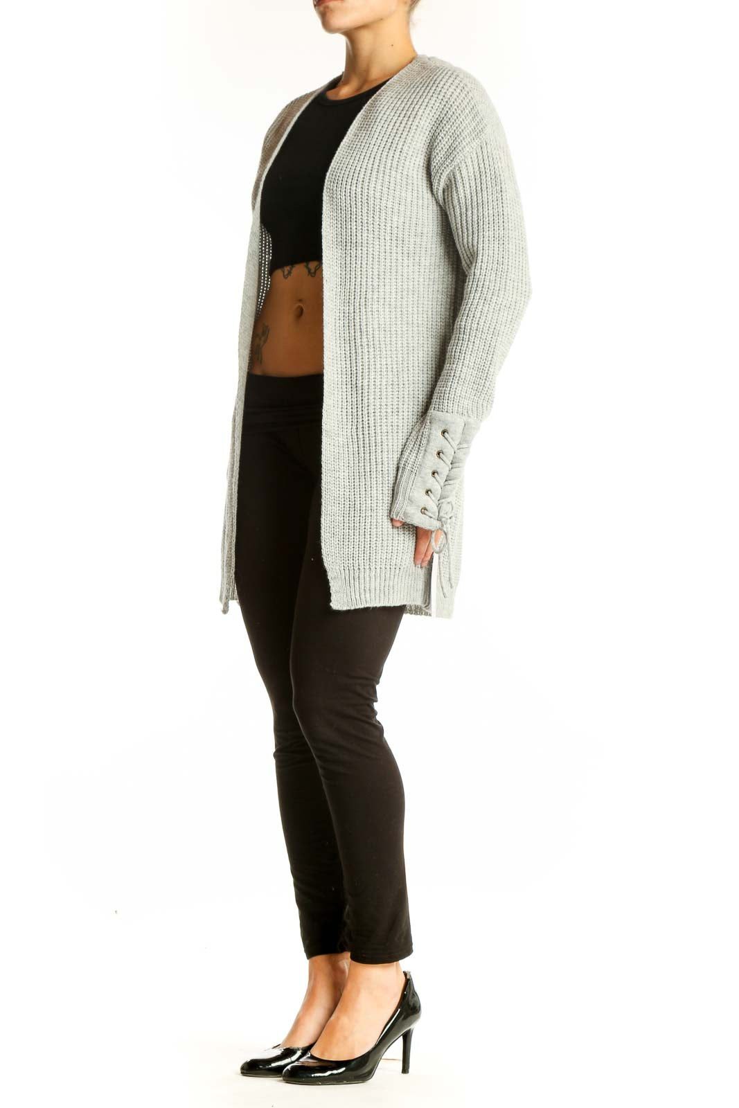 Front view of gray chunky knit cardigan with lace-up sleeve details