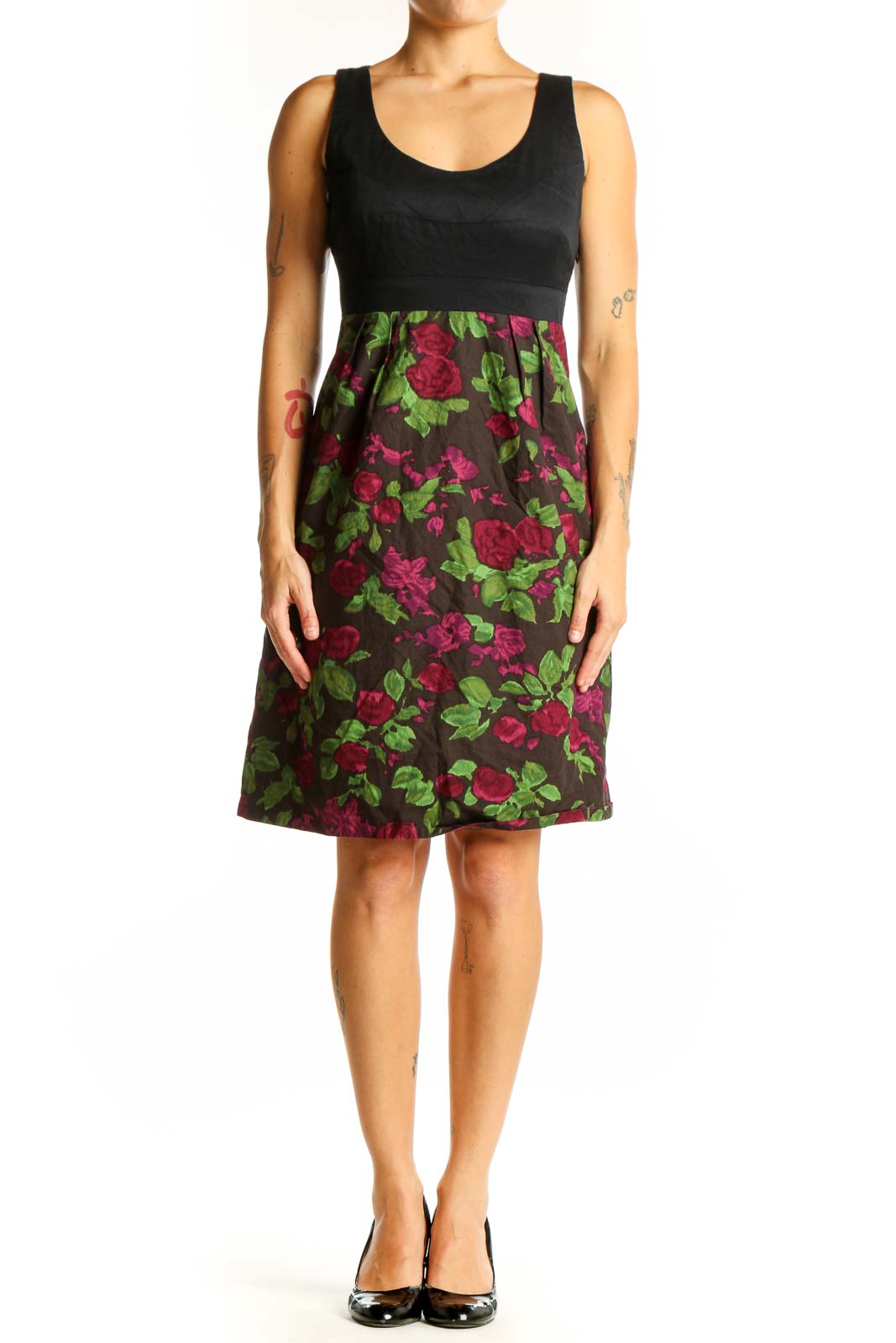 Front view of Moulinette Soeurs black dress with floral print skirt and empire waist