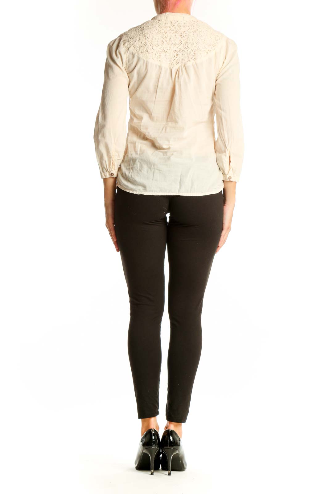 Side view of Sanctuary cream cotton blouse showing lace yoke detail