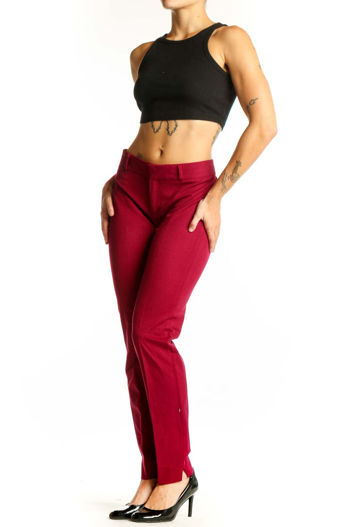 Front view of red slim-fit Banana Republic trousers on model