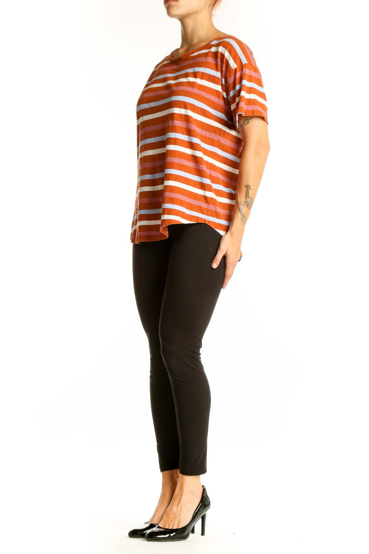 Front view of Madewell orange striped short-sleeve crewneck tee