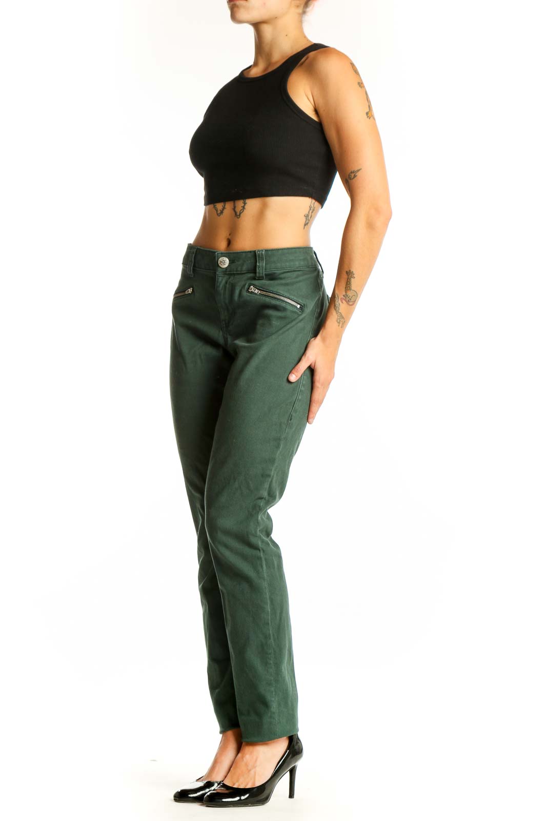Front view of green Cabi straight leg jeans with zip pockets