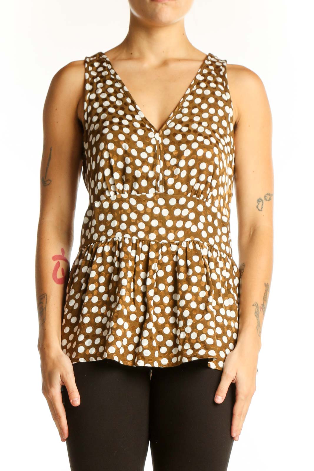 Front view of J.Crew brown polka dot peplum top with V-neckline