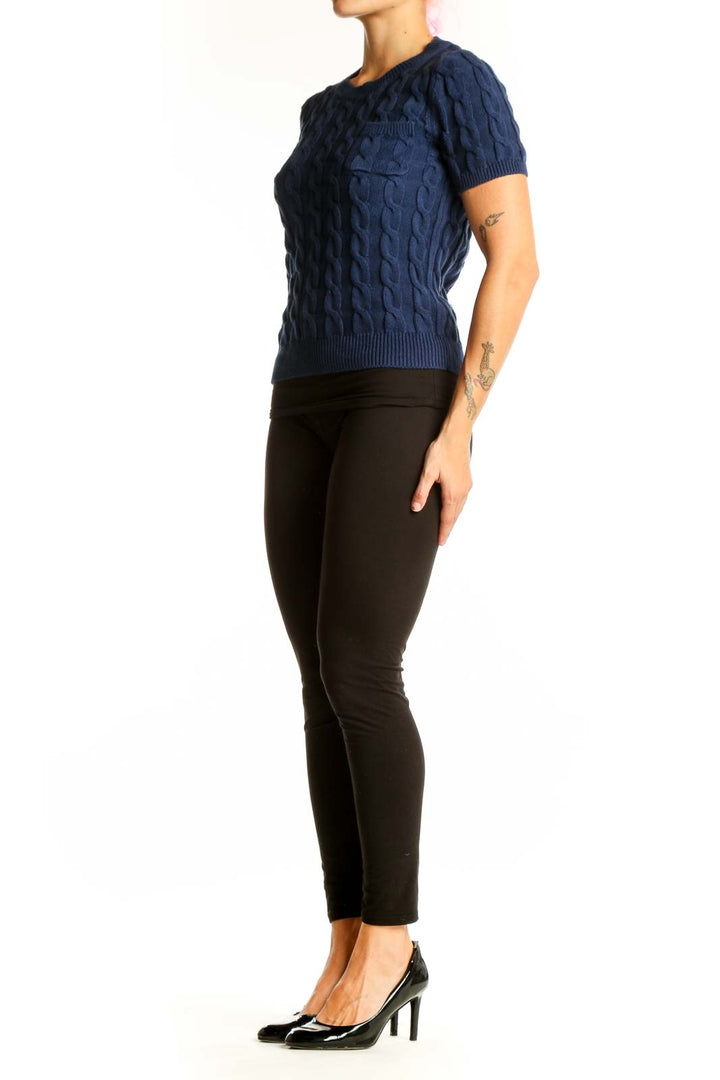 Front view of J.Crew navy cable knit short sleeve sweater on model