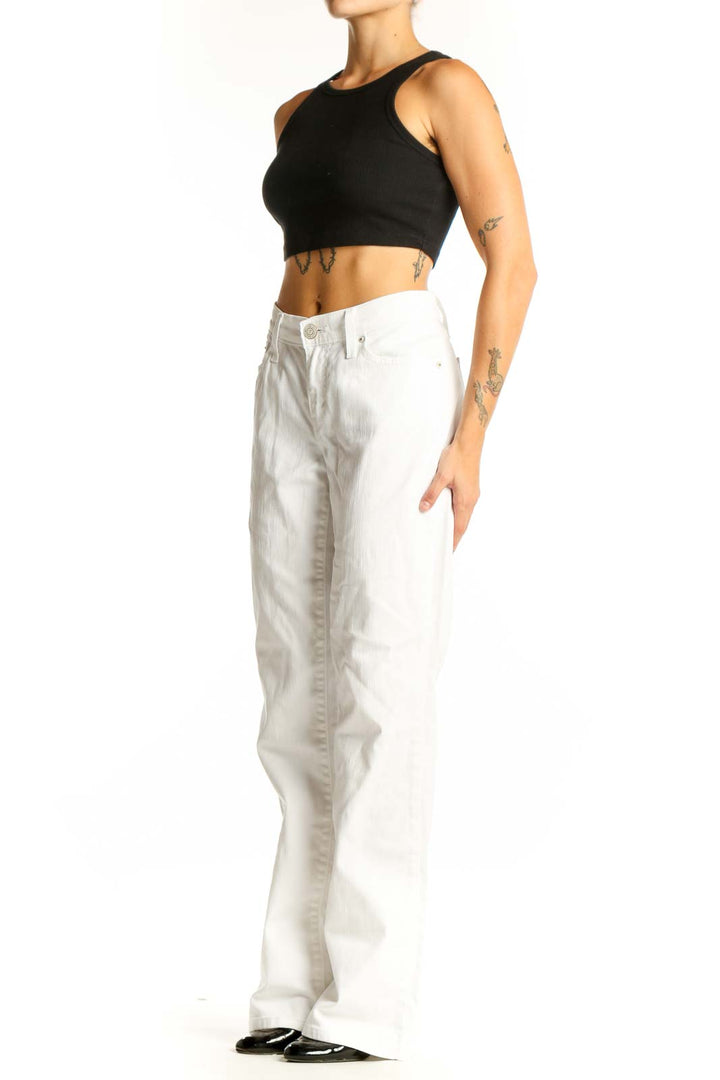 Front view of Levi's white straight leg jeans on model