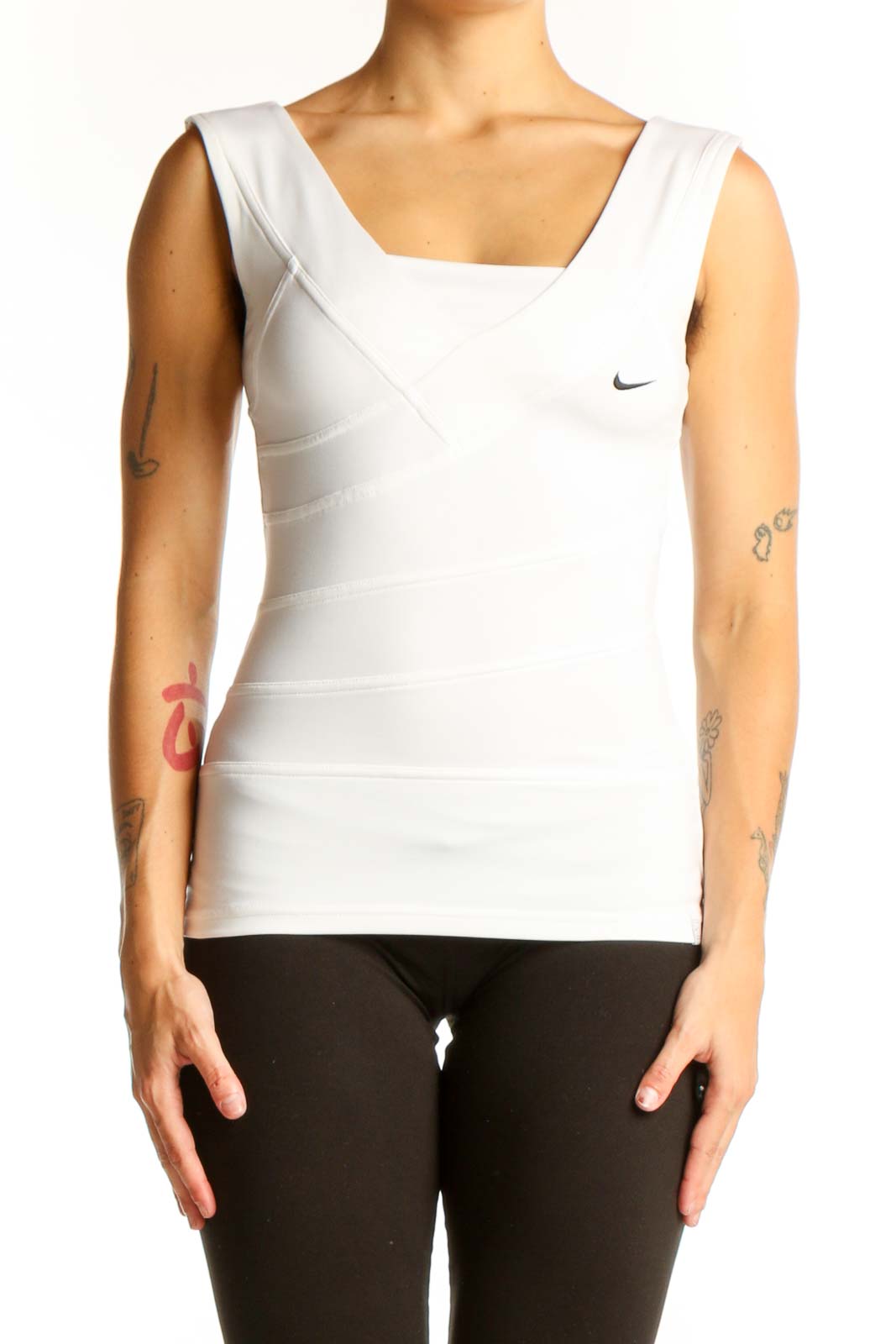 Front view of white Nike sleeveless athletic tank top with asymmetrical strap design