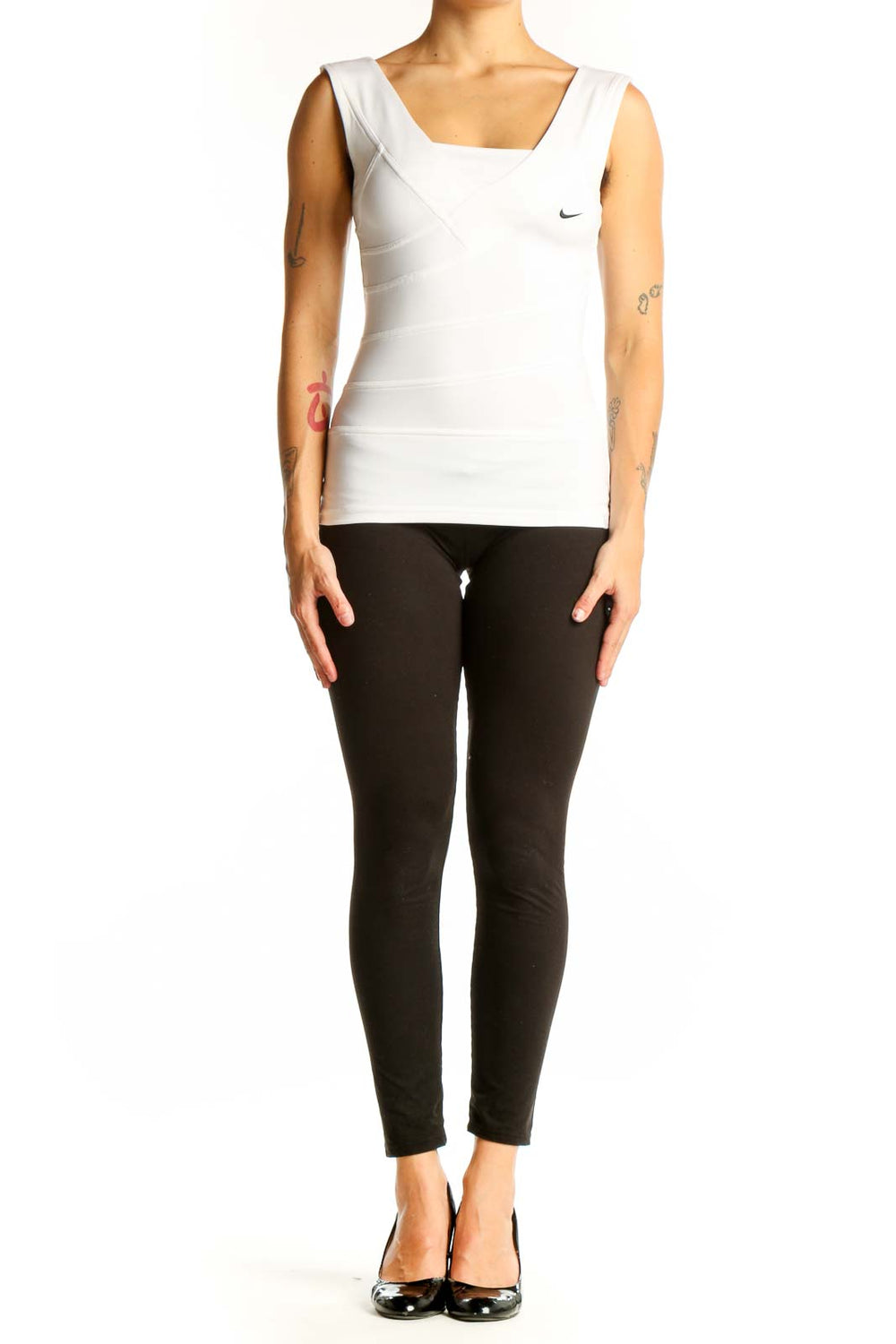 Front view of white Nike sleeveless athletic tank top with asymmetrical strap design