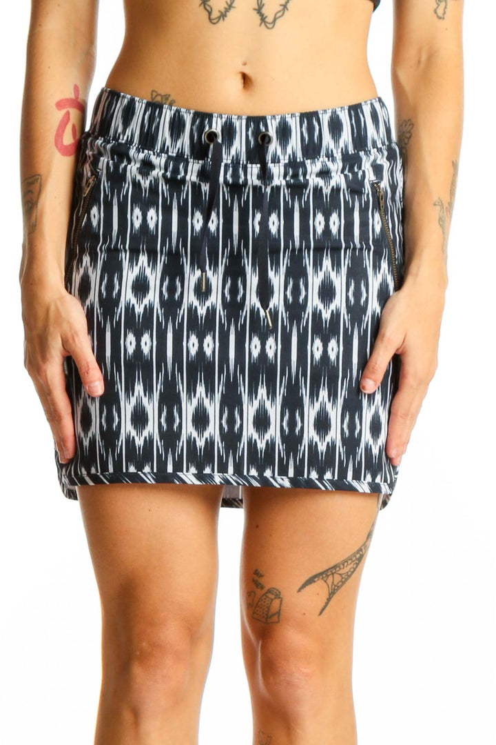 Front view of Athleta black and white ikat print athletic skirt