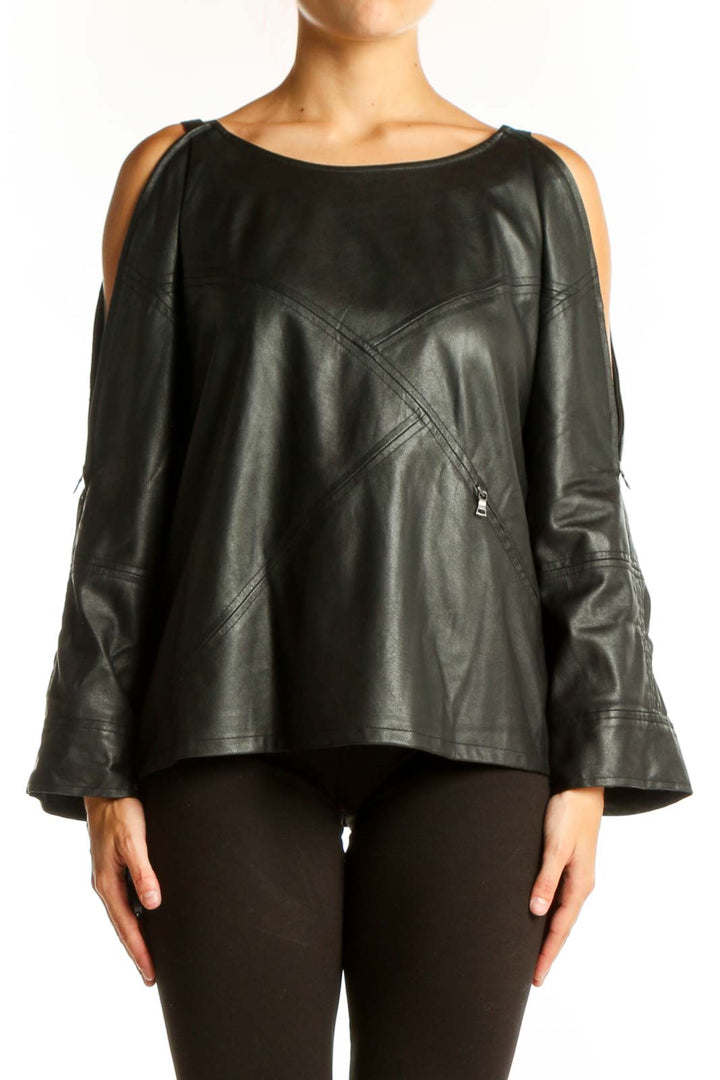 Front view of black leather cold shoulder top with zipper details