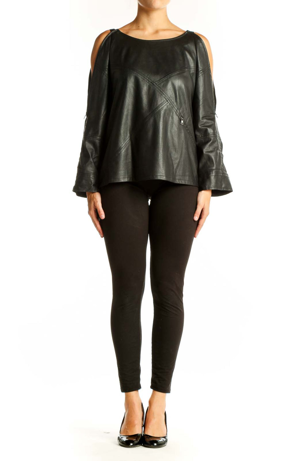 Front view of black leather cold shoulder top with zipper details