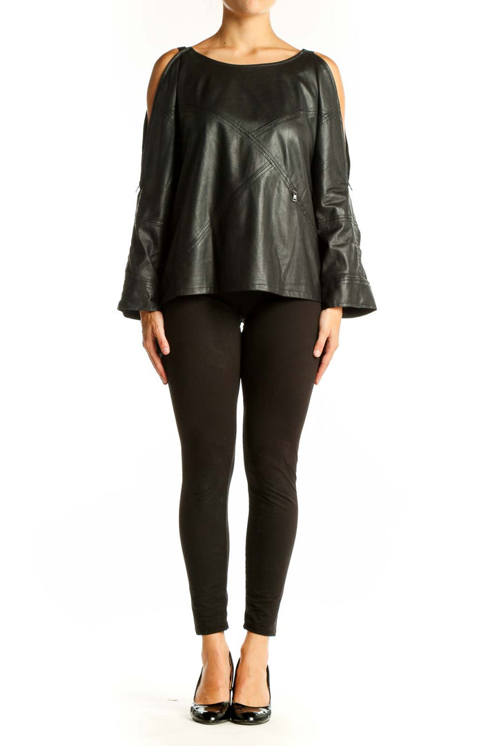 Front view of black leather cold shoulder top with zipper details