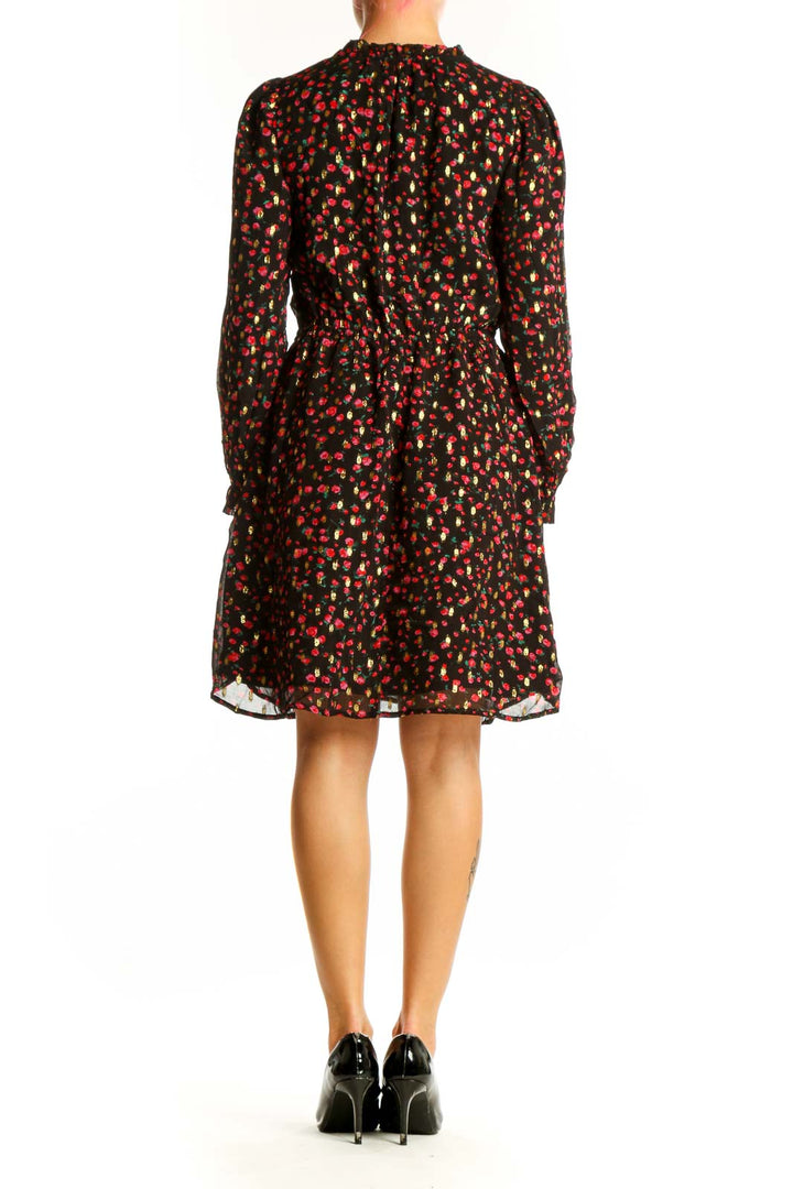 Side view of J.Crew black floral print viscose dress showing gathered waist