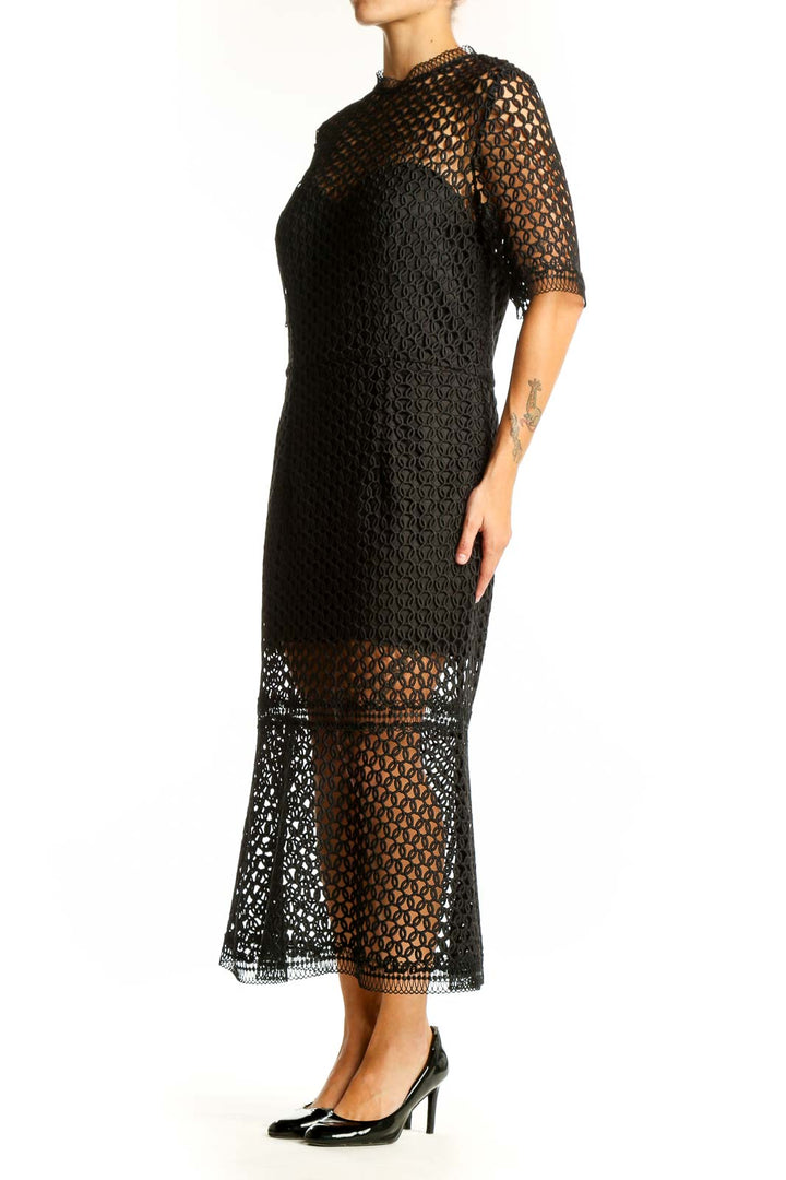 Front view of Jarlo black lace overlay midi dress with geometric pattern