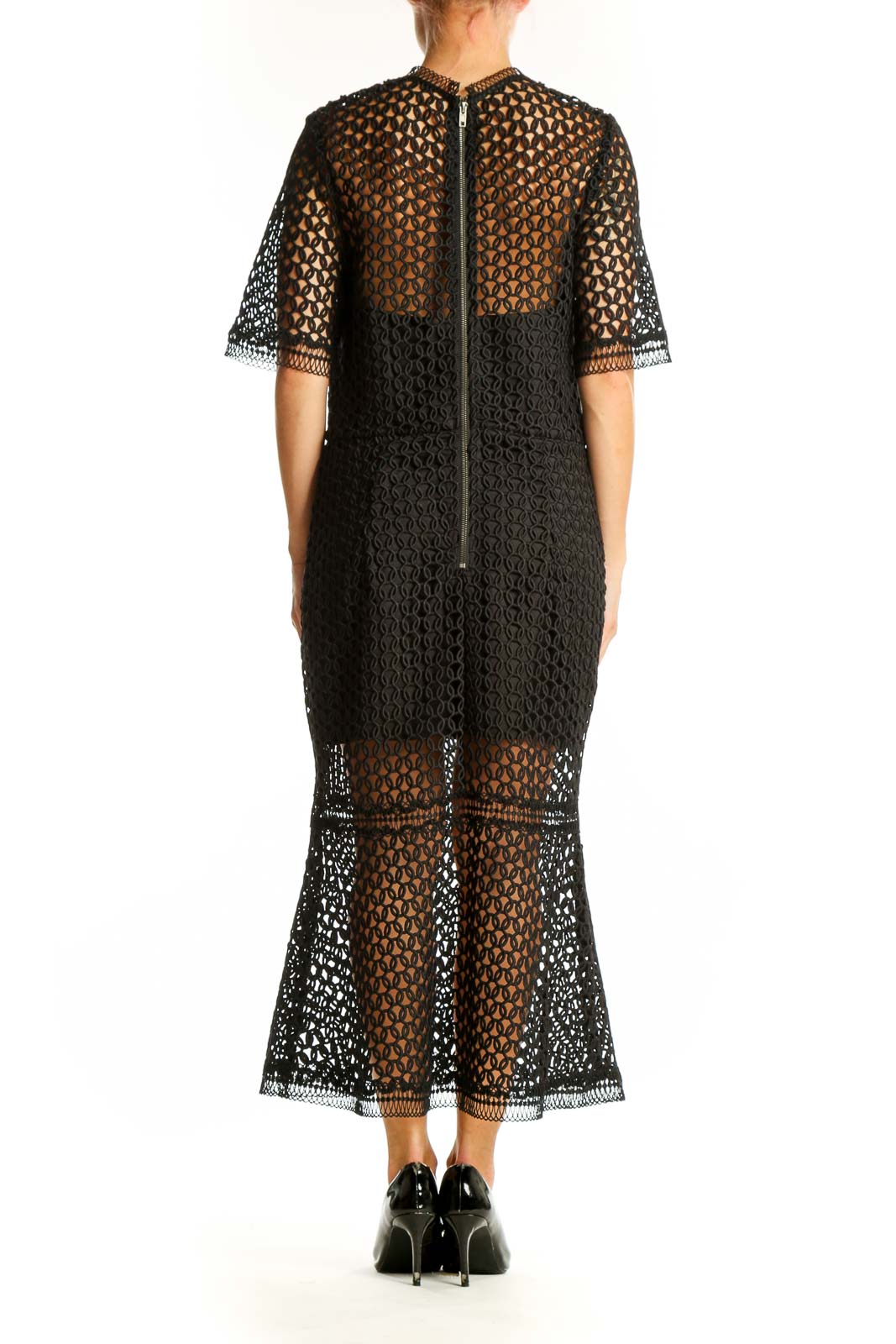 Side view of Jarlo black lace overlay midi dress showing flared skirt