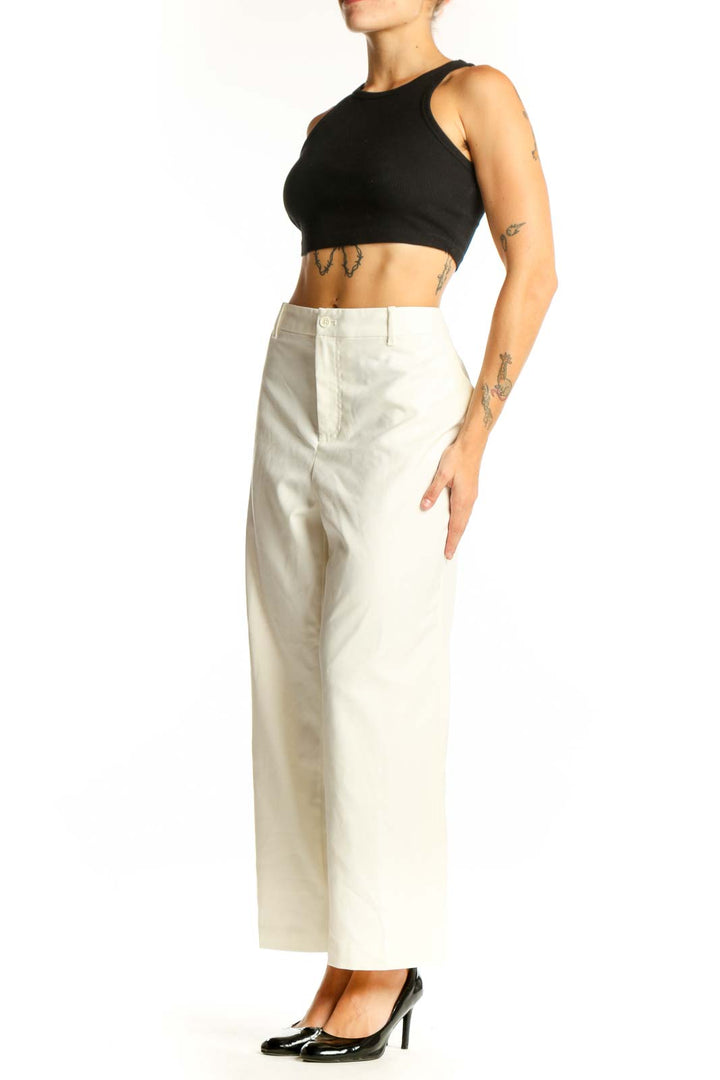 Front view of white wide-leg dress pants by Jaclyn & Smith