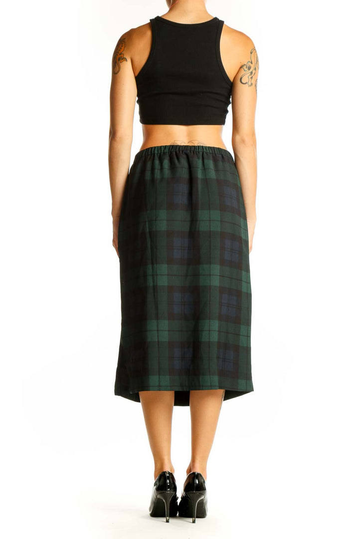 Side view of J.Crew green and navy plaid midi skirt with pockets