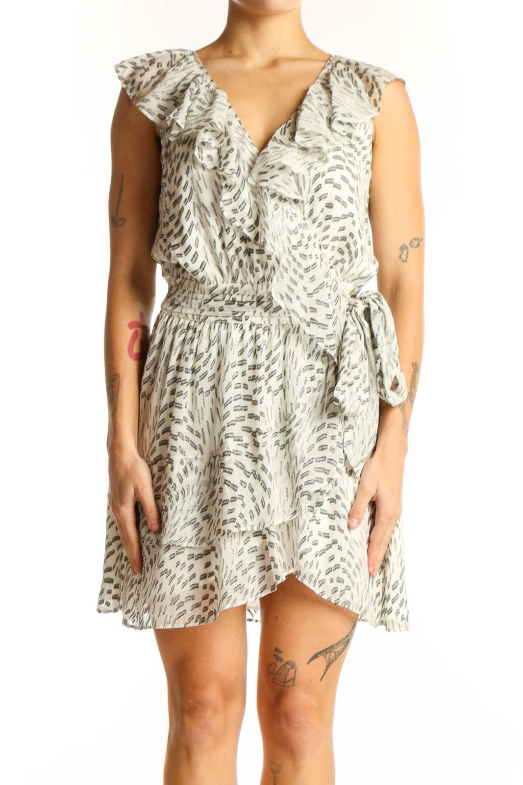 Front view of Ramy Brook beige floral print wrap dress with ruffle details