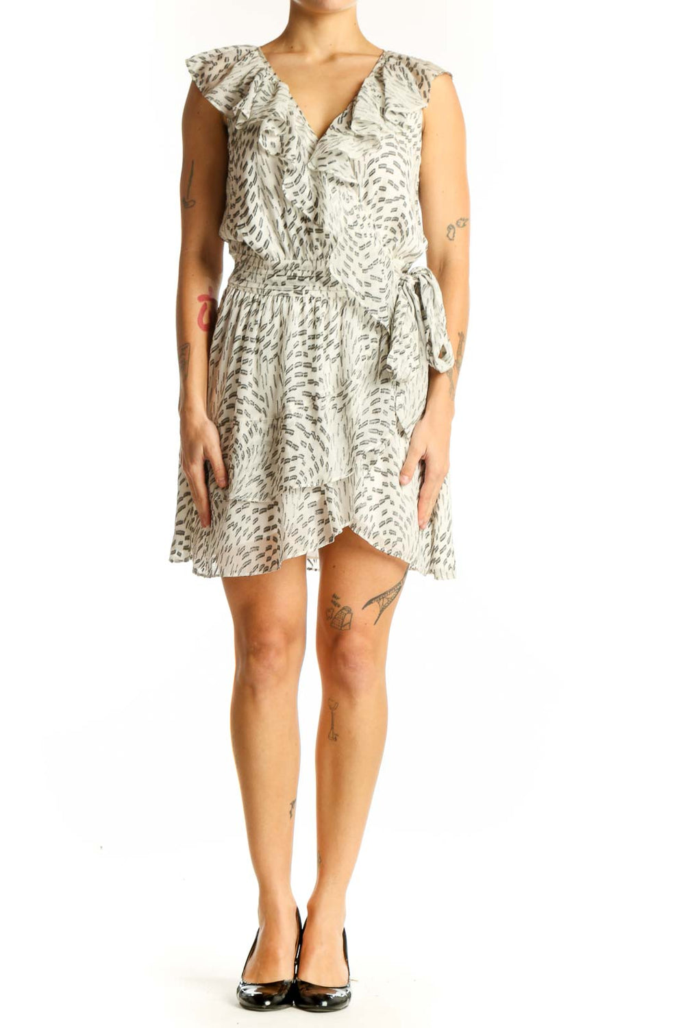 Front view of Ramy Brook beige floral print wrap dress with ruffle details