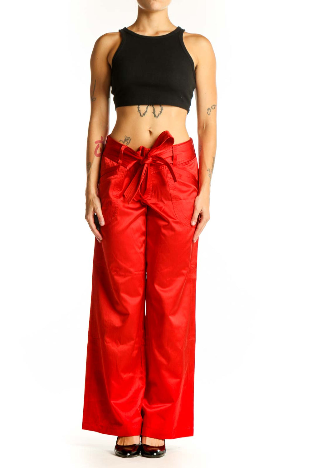 Front view of red satin wide-leg pants with bow-tie waist by Armani Exchange