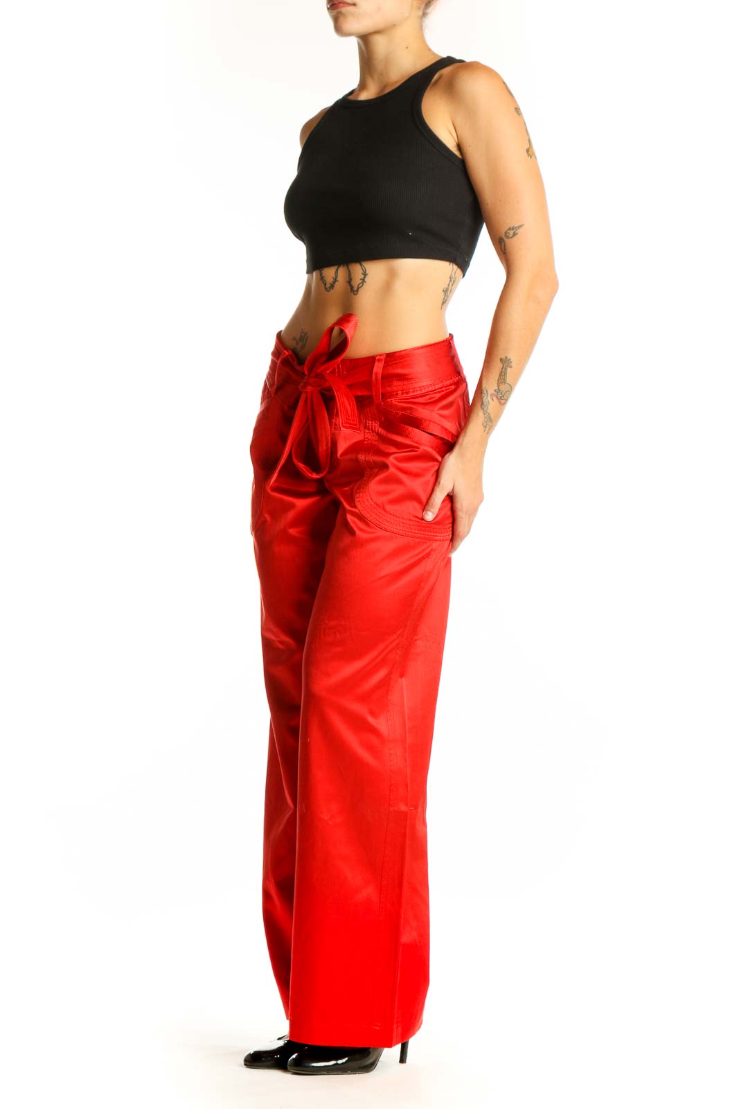 Front view of red satin wide-leg pants with bow-tie waist by Armani Exchange