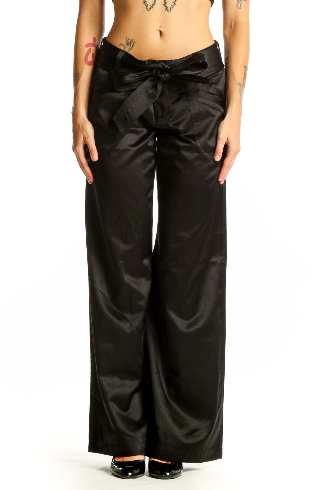 Front view of Armani Exchange black satin wide-leg dress pants with bow detail