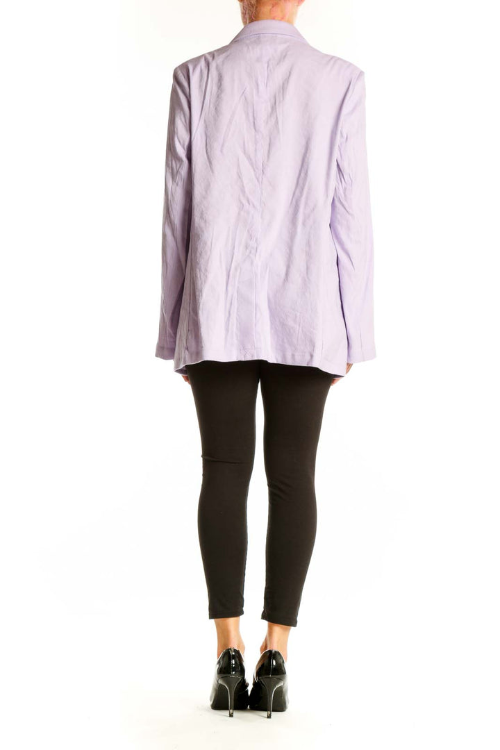 Side view of lavender Halston oversized linen-blend blazer on model