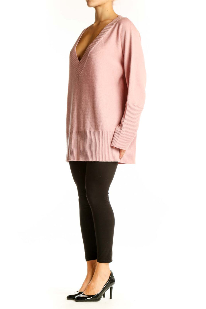 Front view of pink Merino wool V-neck sweater from Casual Corner