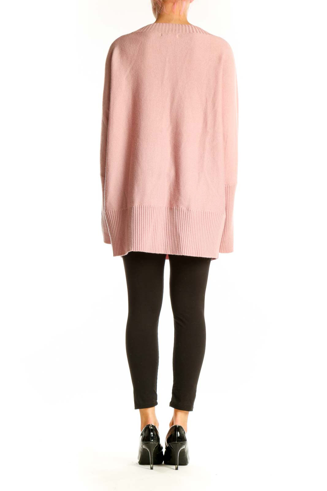 Side view of pink Merino wool V-neck sweater from Casual Corner on model