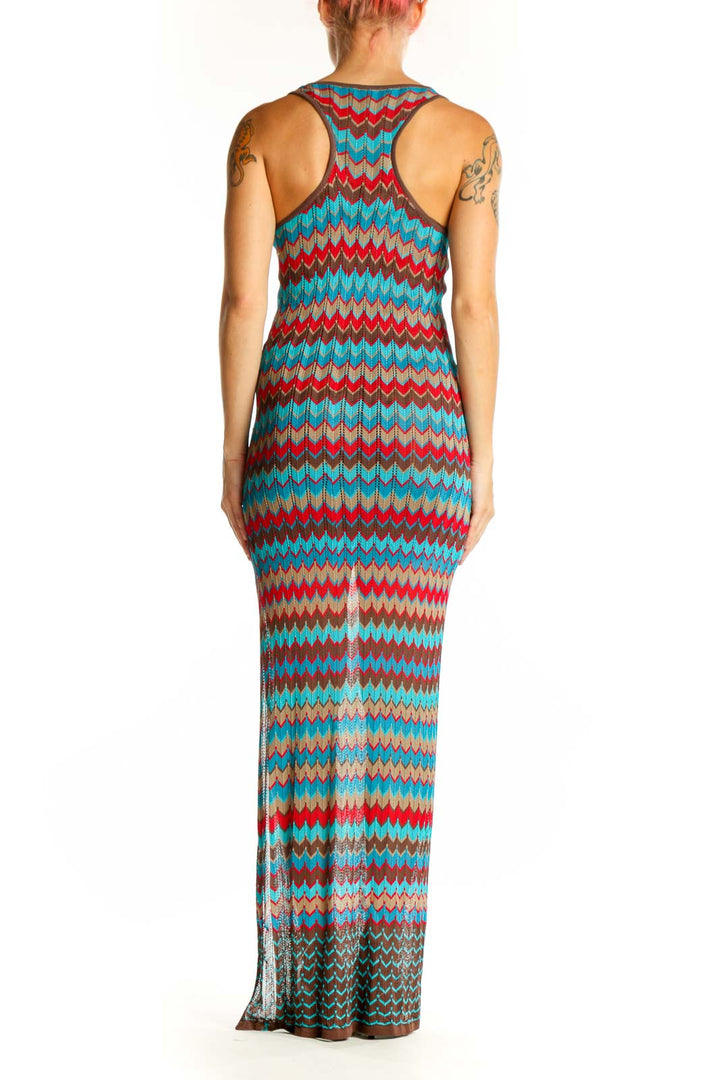 Side view of Haute Hippie Turquoise Chevron Knit Maxi Dress showing side slit