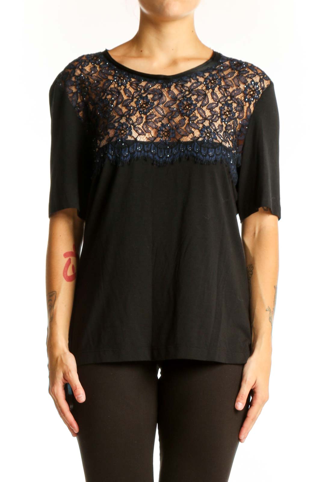 Front view of black St. John Couture top with sparkling lace yoke