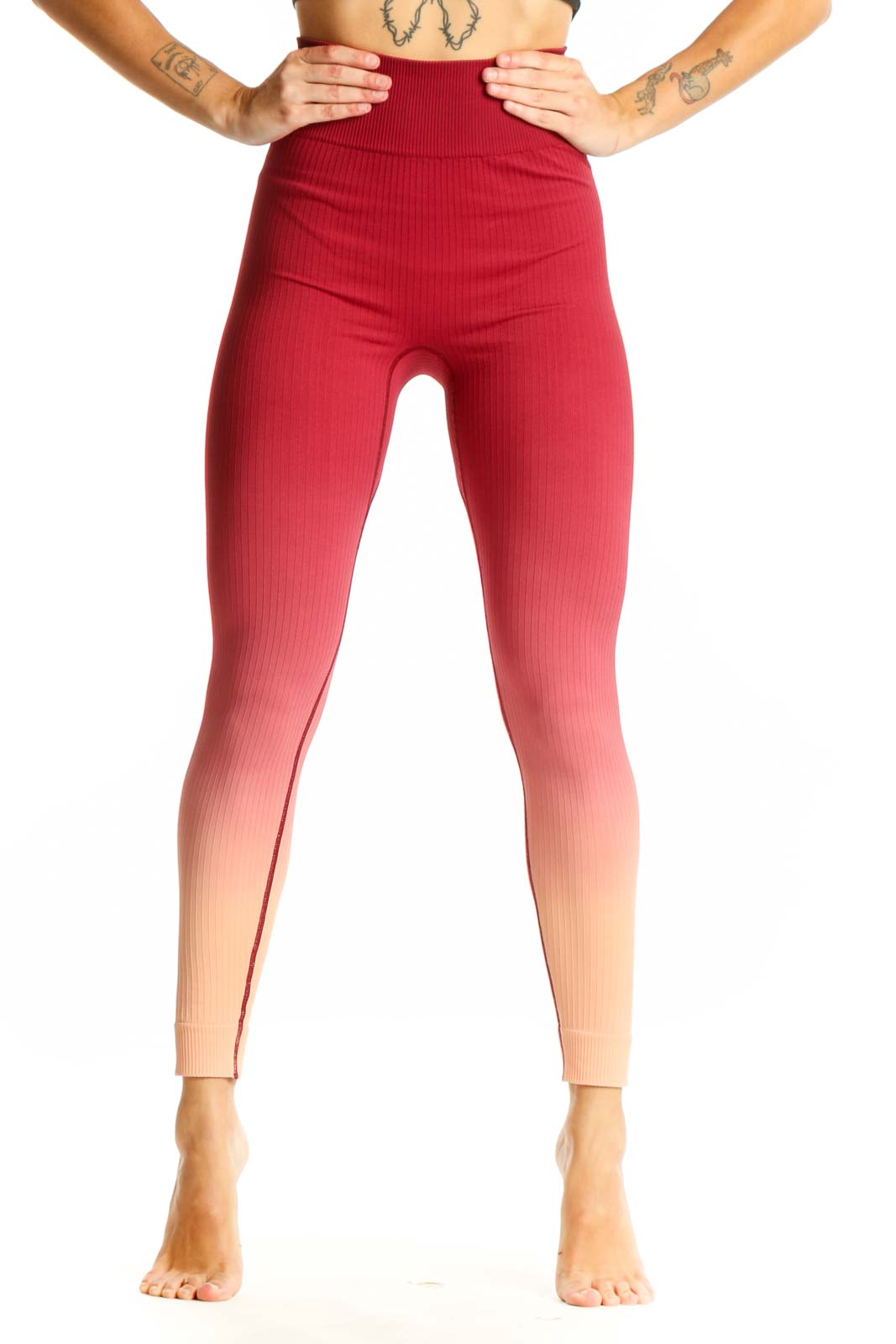 Front view of red ombre high-waisted ribbed leggings from The Upside