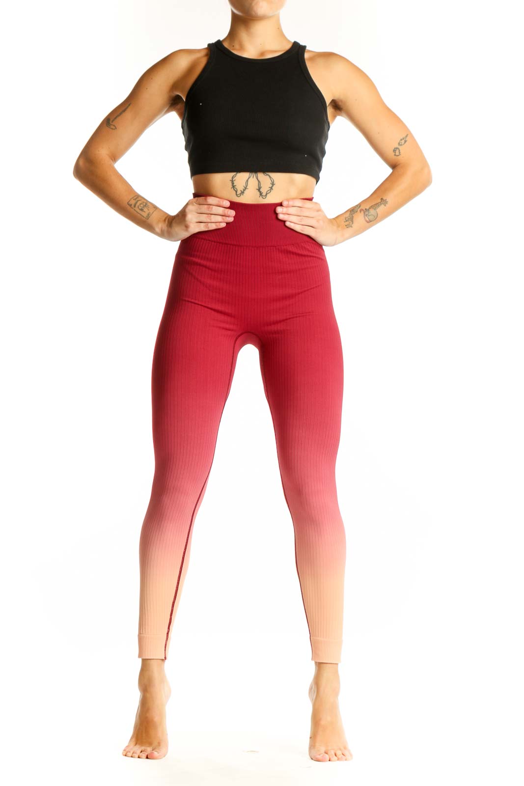Front view of red ombre high-waisted ribbed leggings from The Upside