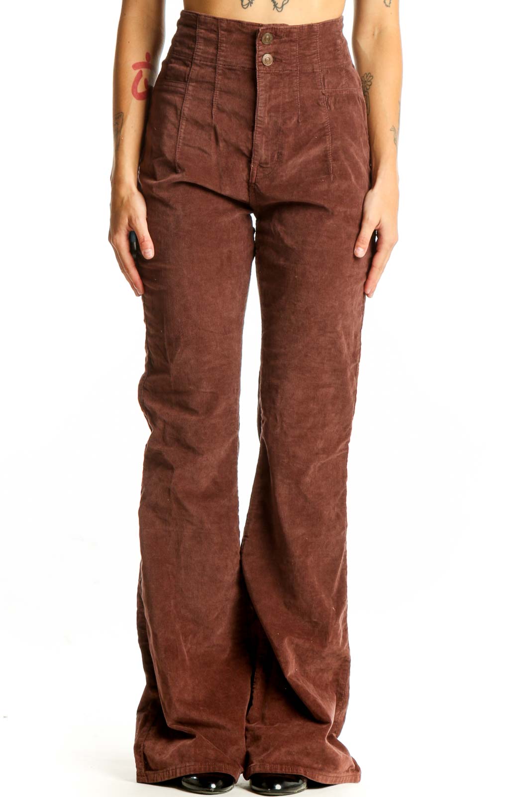Front view of WE THE FREE brown corduroy high-waisted flared pants