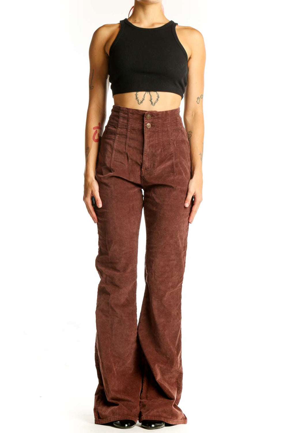 Front view of WE THE FREE brown corduroy high-waisted flared pants