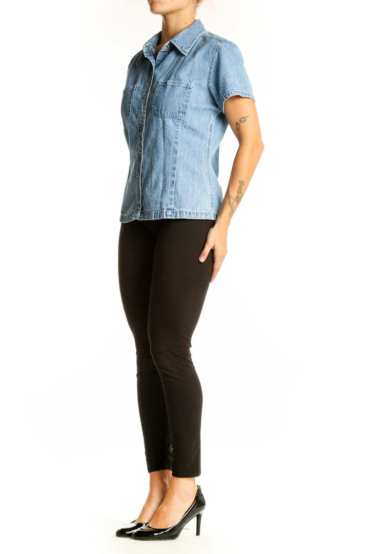 Front view of Gap light blue denim short-sleeve button-up shirt