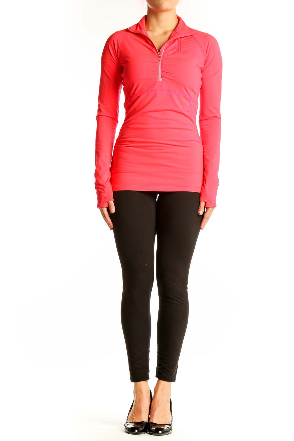 Front view of coral Athleta half-zip long sleeve athletic top