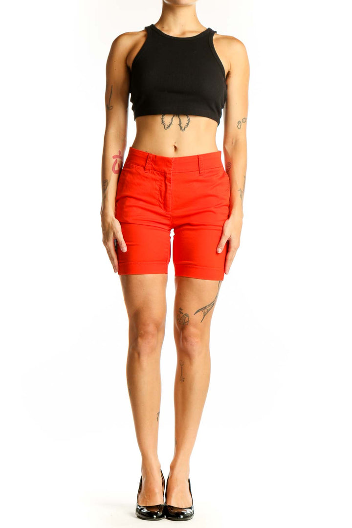Front view of red J.Crew cotton chino shorts on model